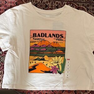 Levi's White Short Sleeve Tee with Orange, Pink & Green Badlands Graphic